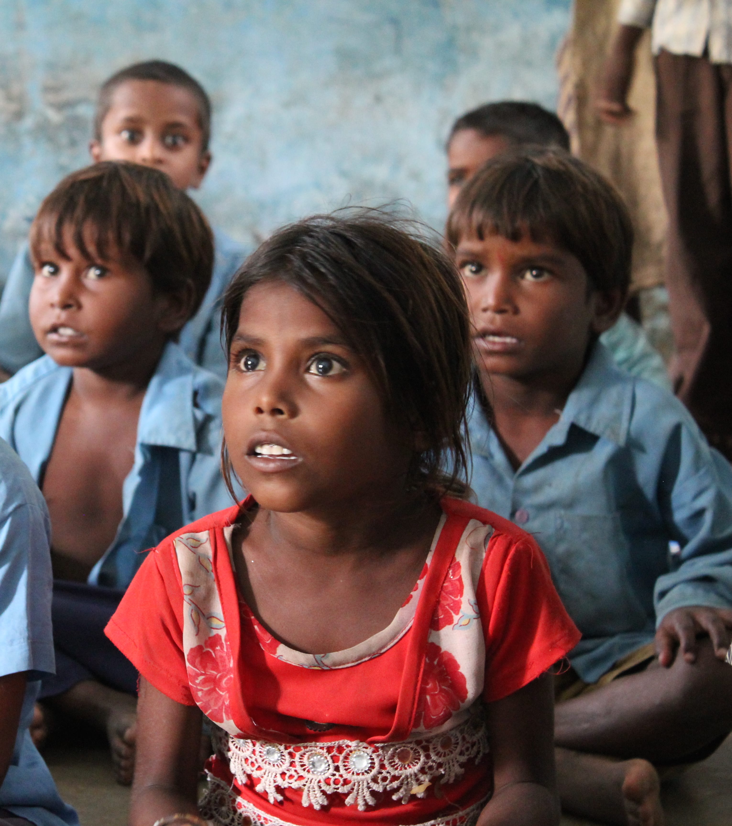 Young children learning in a class at school