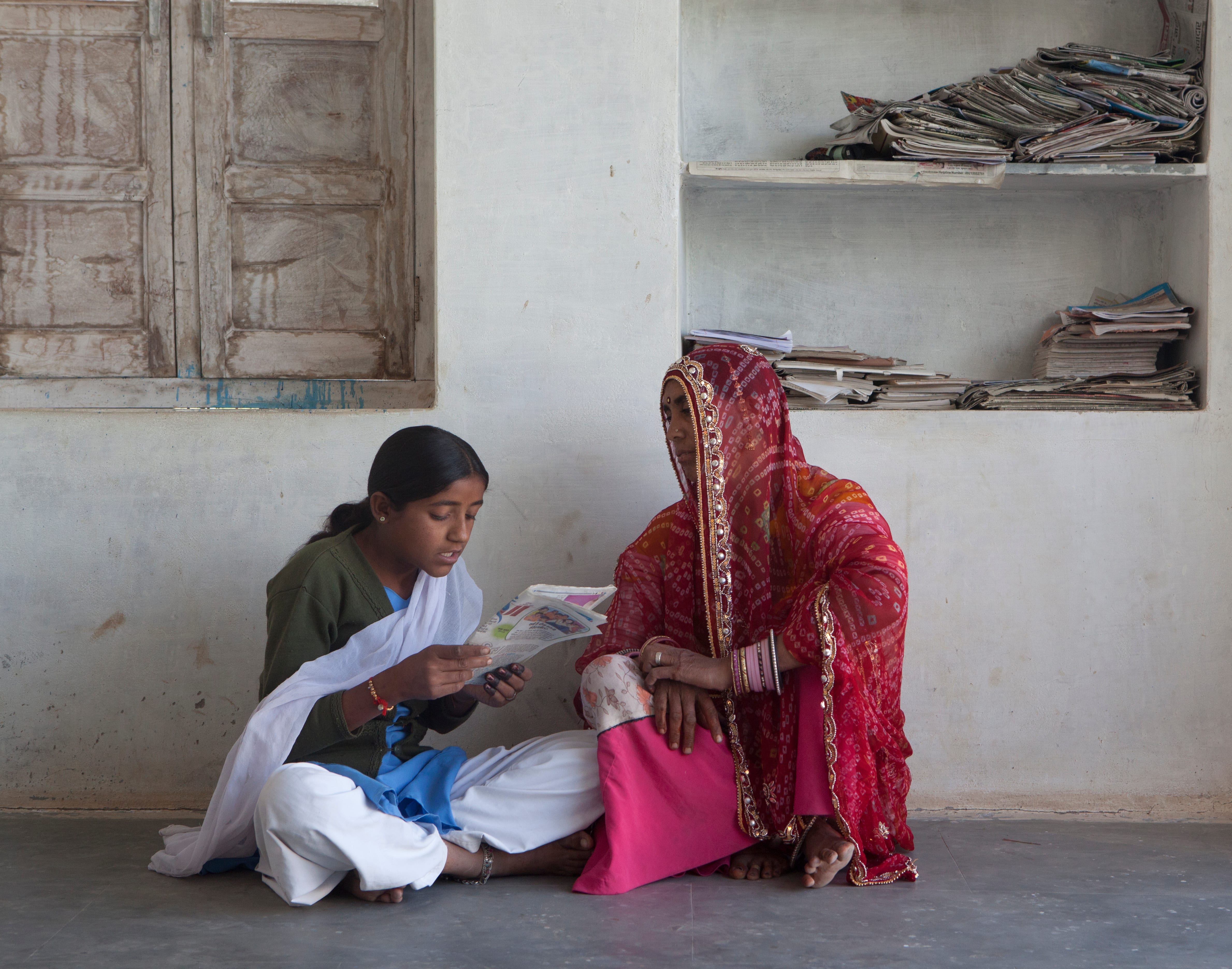 Chaddi reads to her mother by Mark Tuschman